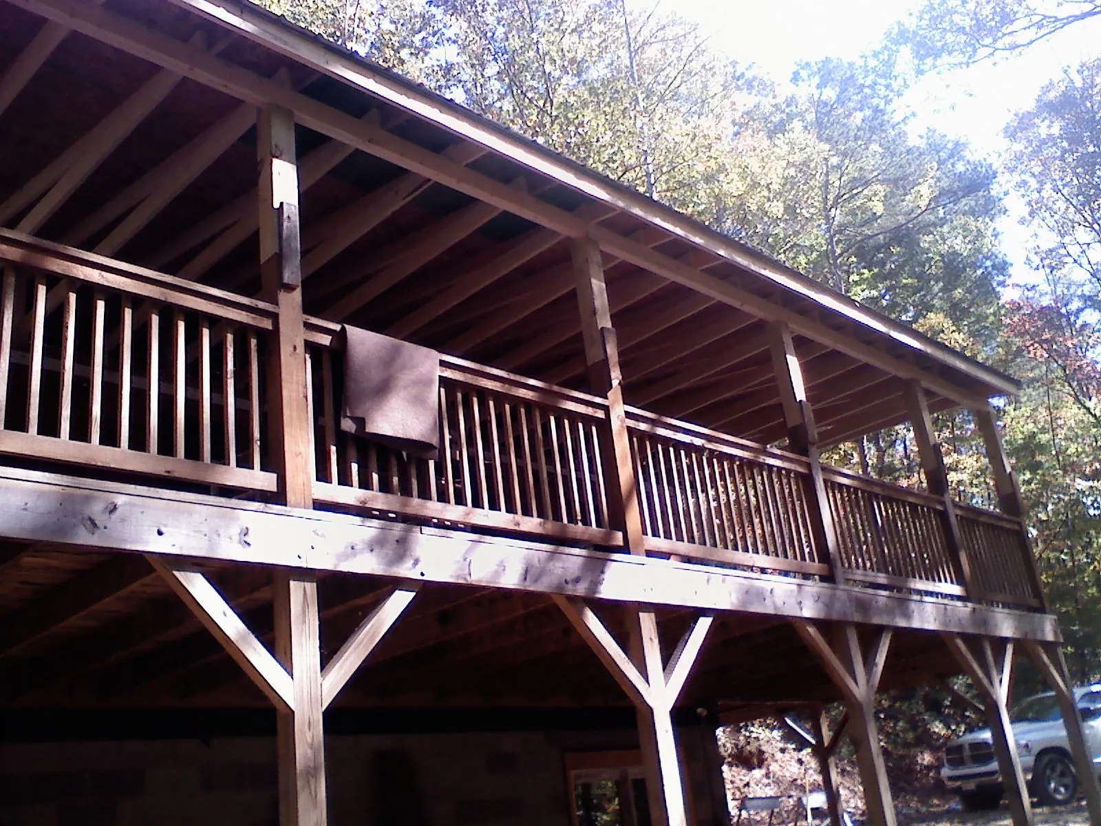 Timber framing under a new elevated porch and deck — Roof Leak Repair in Modoc by Roofing Brothers